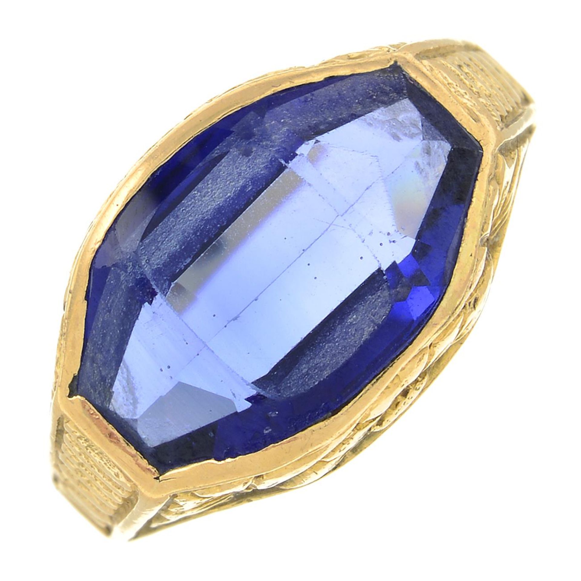 A synthetic sapphire dress ring, with embossed gallery.Ring size P.