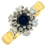 An early 20th century 22ct gold sapphire and vari-cut diamond cluster ring.Estimated total diamond