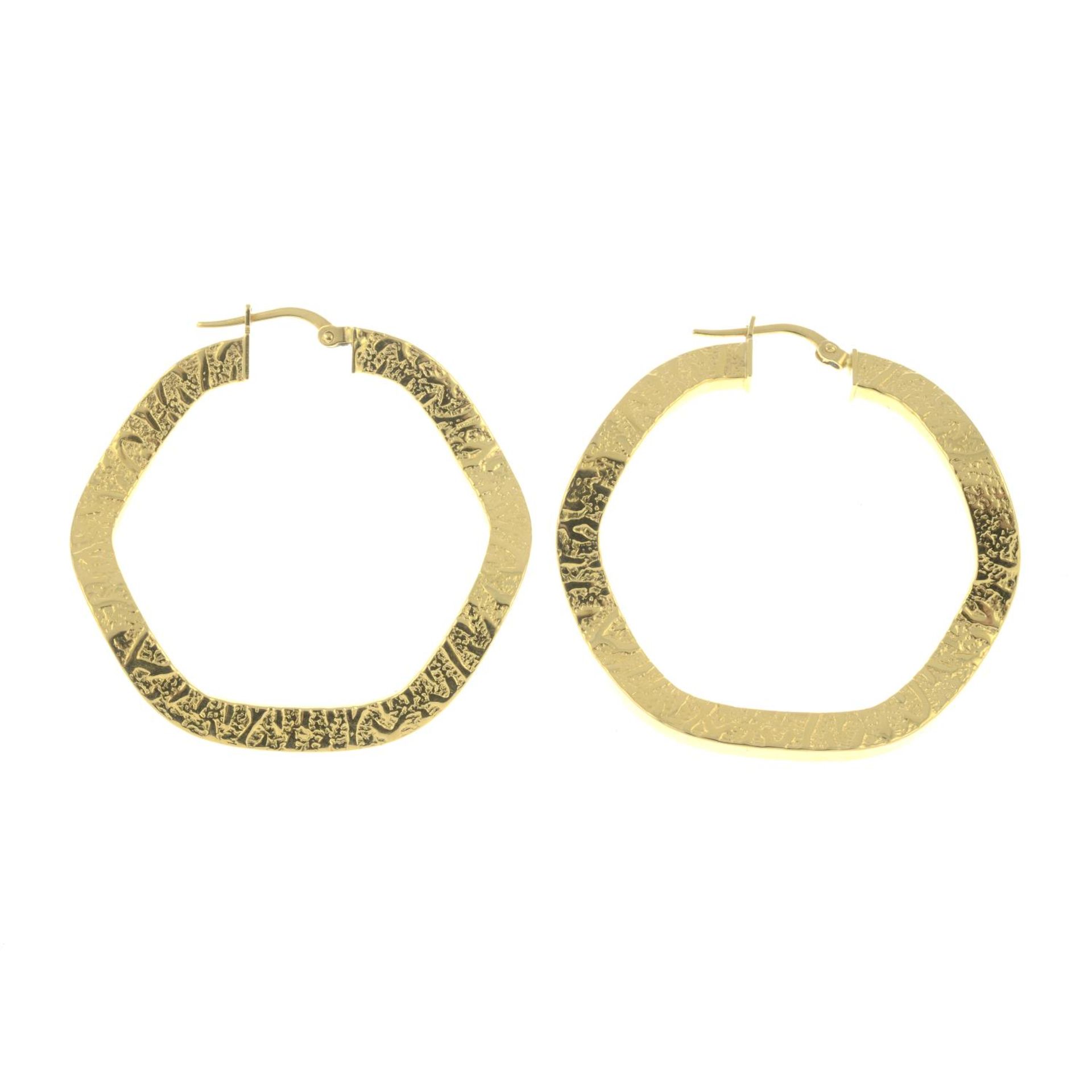 A pair of textured hoop earrings.Italian marks.