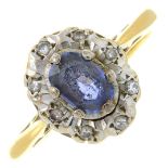 An 18ct gold sapphire and diamond dress ring.Hallmarks for 18ct gold.