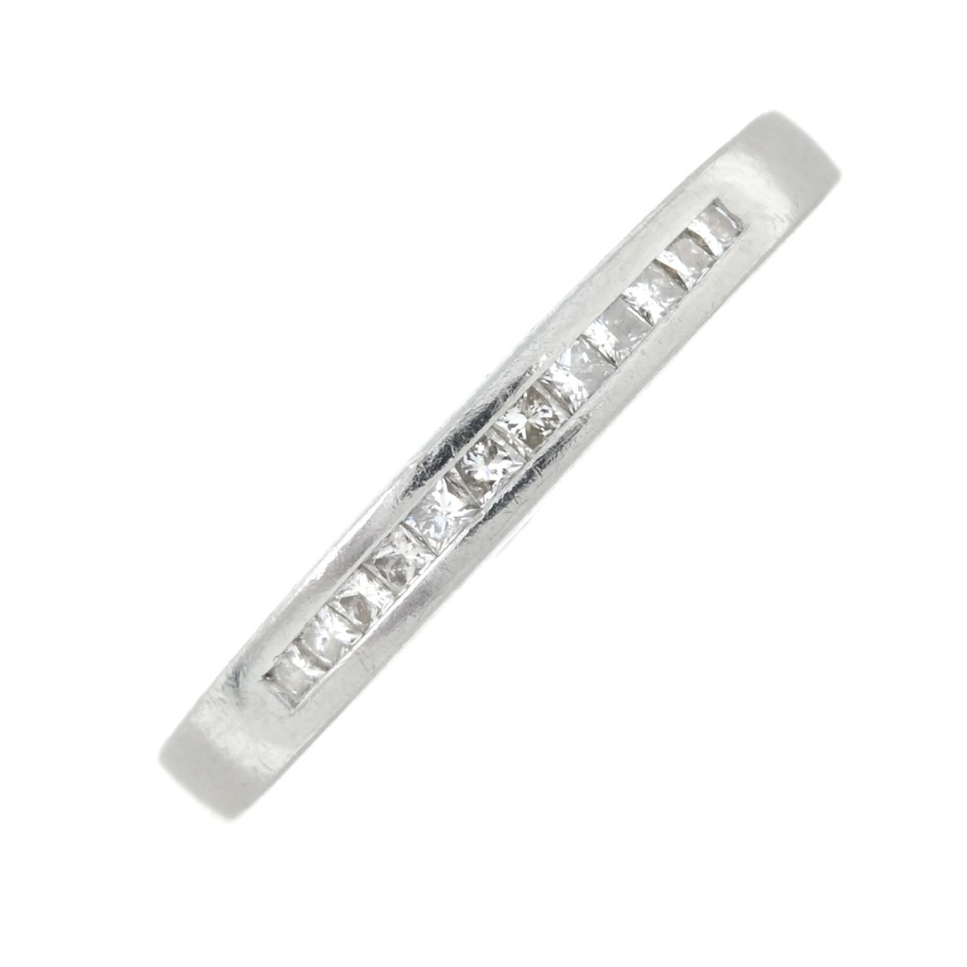 A platinum square-shape diamond half eternity ring.Total diamond weight 0.15ct,