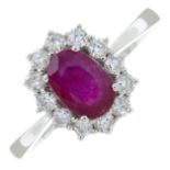 An 18ct gold ruby and diamond cluster ring.Ruby weight 1.02cts.