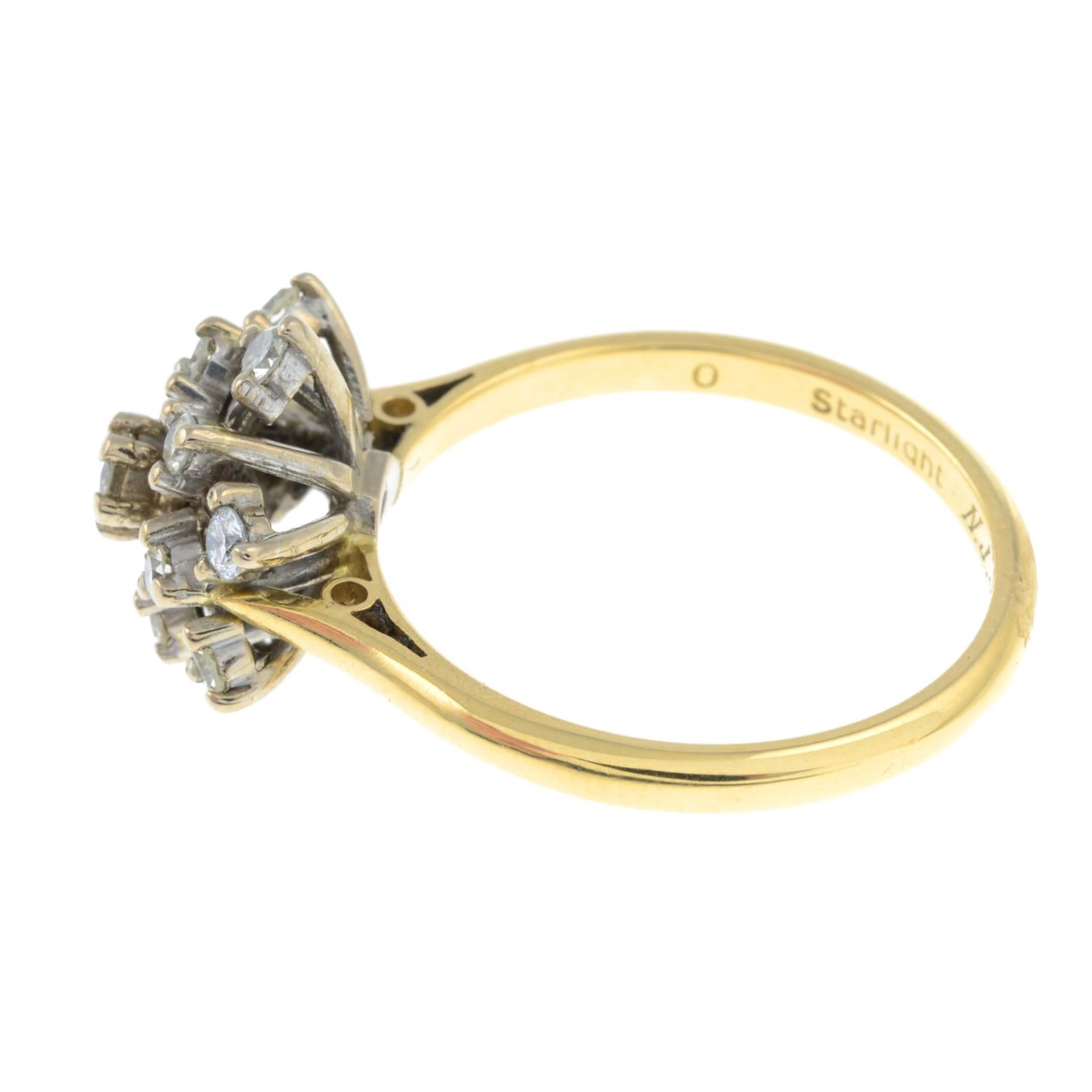 An 18ct gold brilliant-cut diamond star cluster ring.Estimated total diamond weight 0.40ct. - Bild 2 aus 3