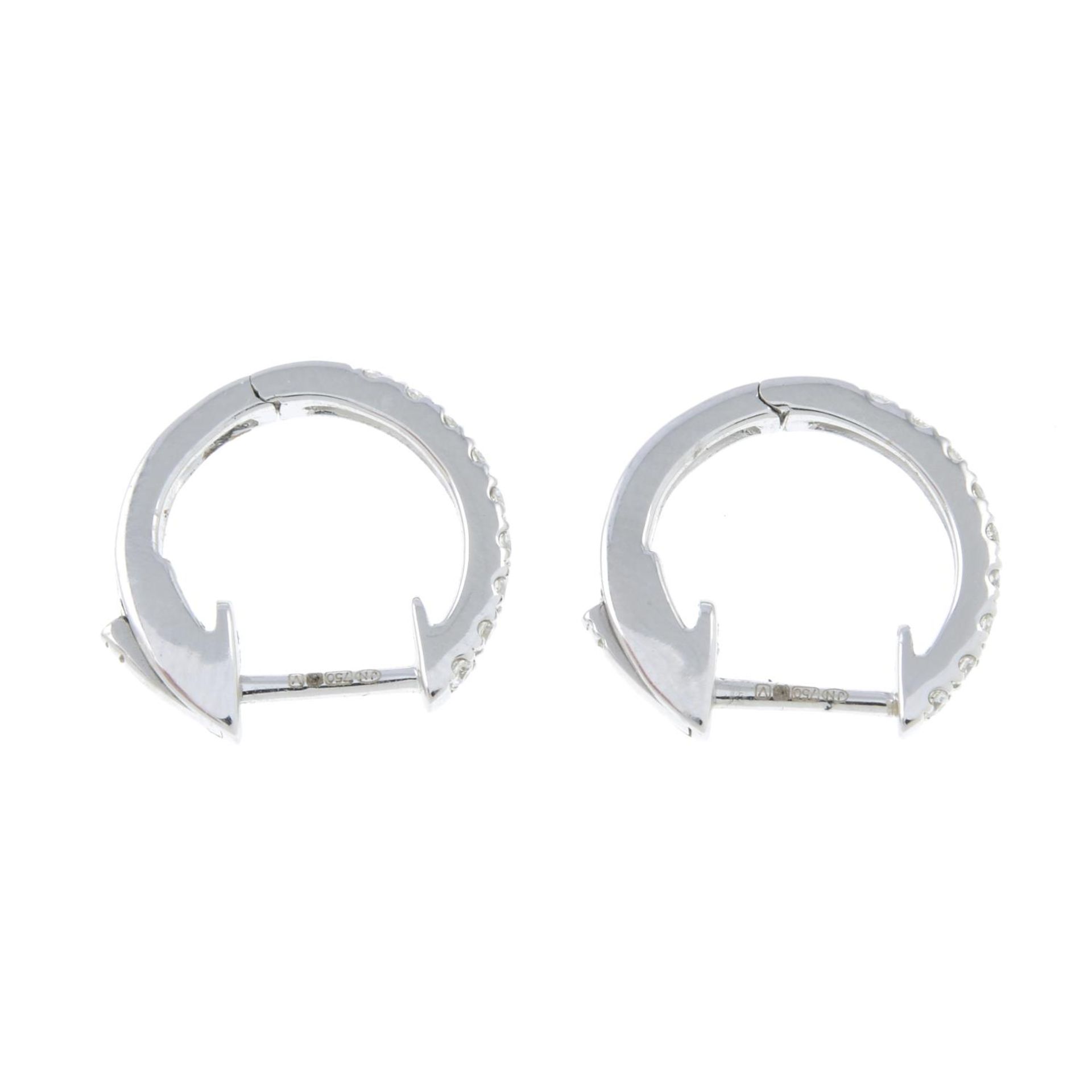 A pair of brilliant-cut diamond hoop earrings.Total diamond weight 0.28ct, stamped to band. - Bild 2 aus 2