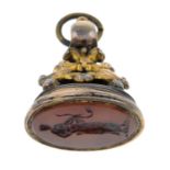 A late 19th century carnelian intaglio seal fob, believed to depict Hygeia.Length 3.5cms.