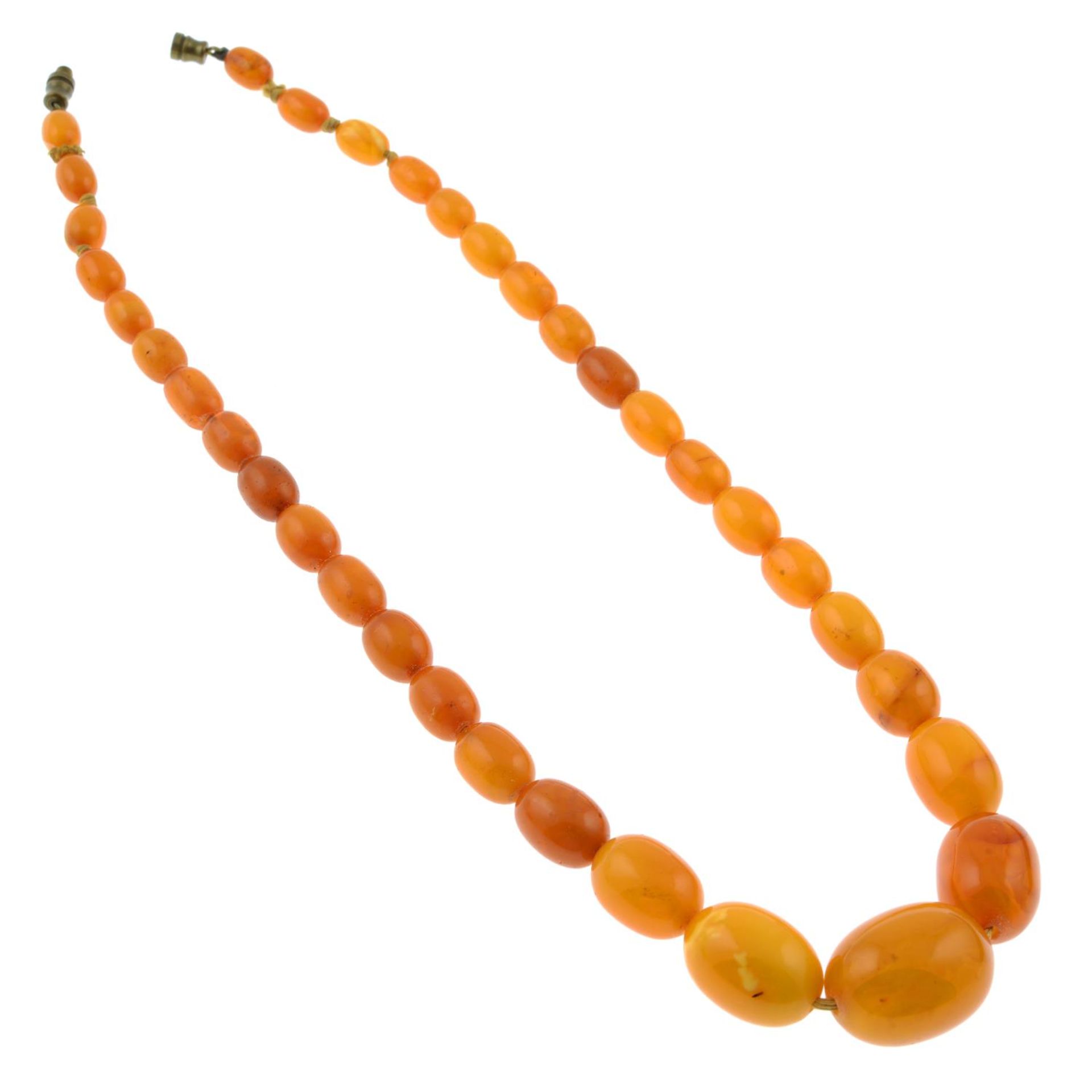 A graduated amber bead necklace.Beads measuring approximately 25 to 7mms.Length 46cms. - Image 2 of 2