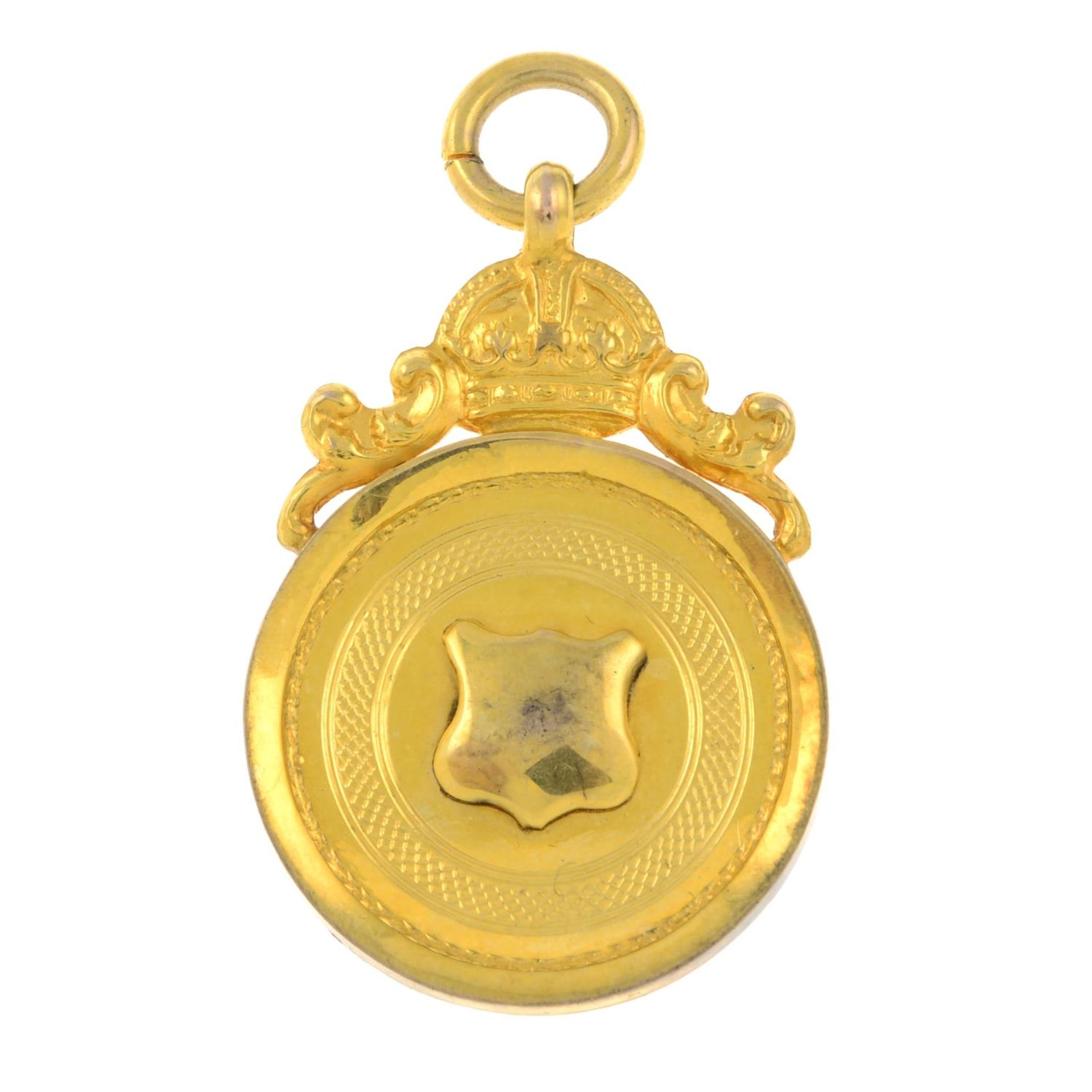 An early 20th century 9ct gold medallion pendant.Hallmarks for Chester, 1927.
