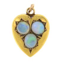 An Edwardian 15ct gold opal heart pendant.Hallmarks for Chester, 1905.