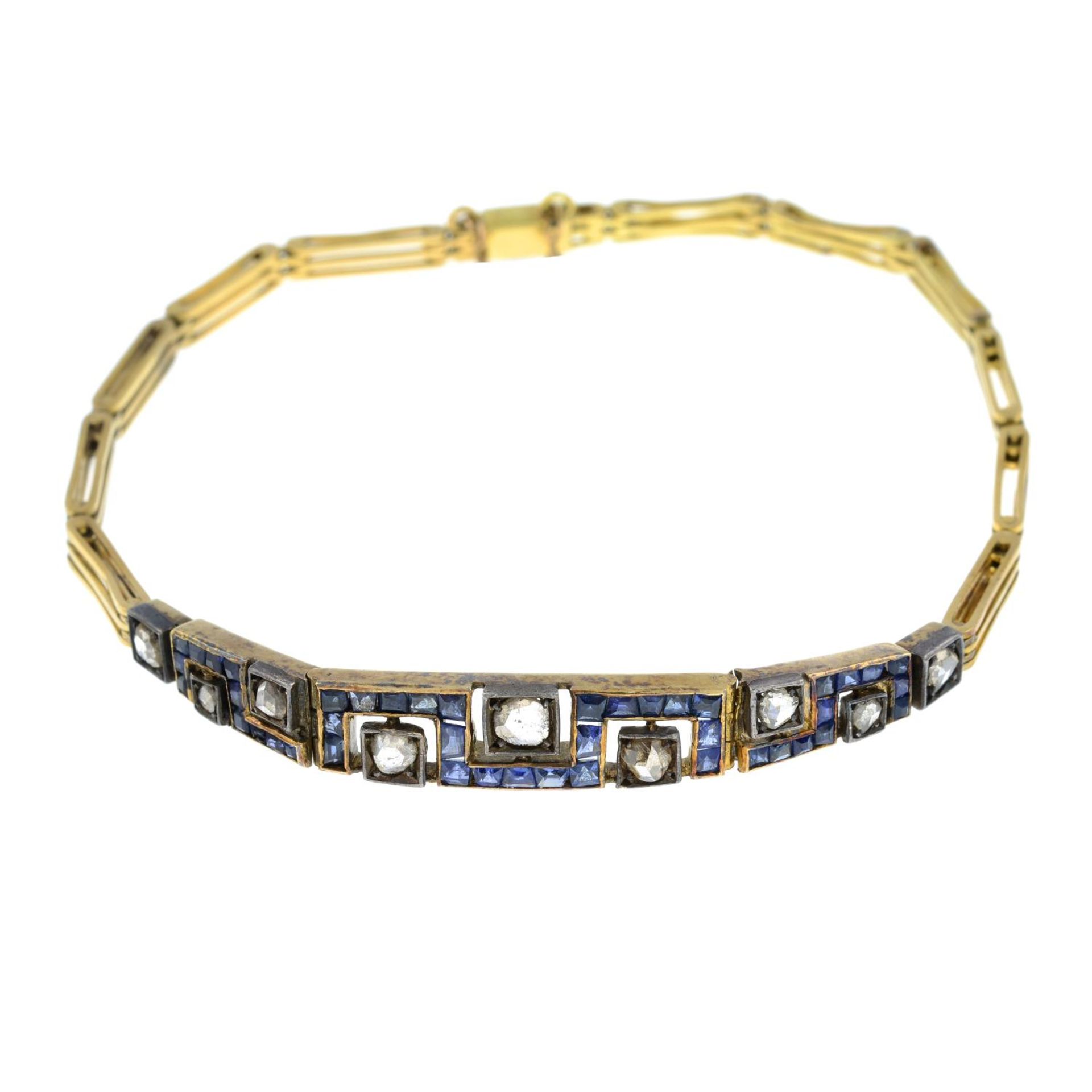 A sapphire and rose-cut diamond bracelet.Stamped K18.Length 19cms.