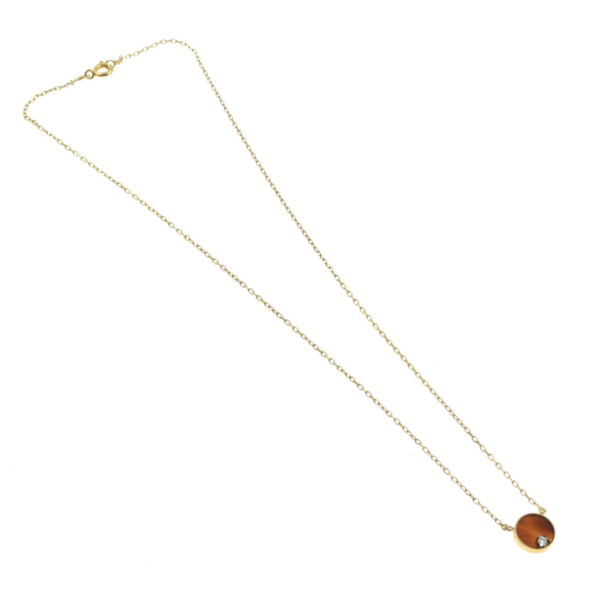 A carnelian and diamond pendant, on an integral trace-link chain.French assay marks. - Image 3 of 3