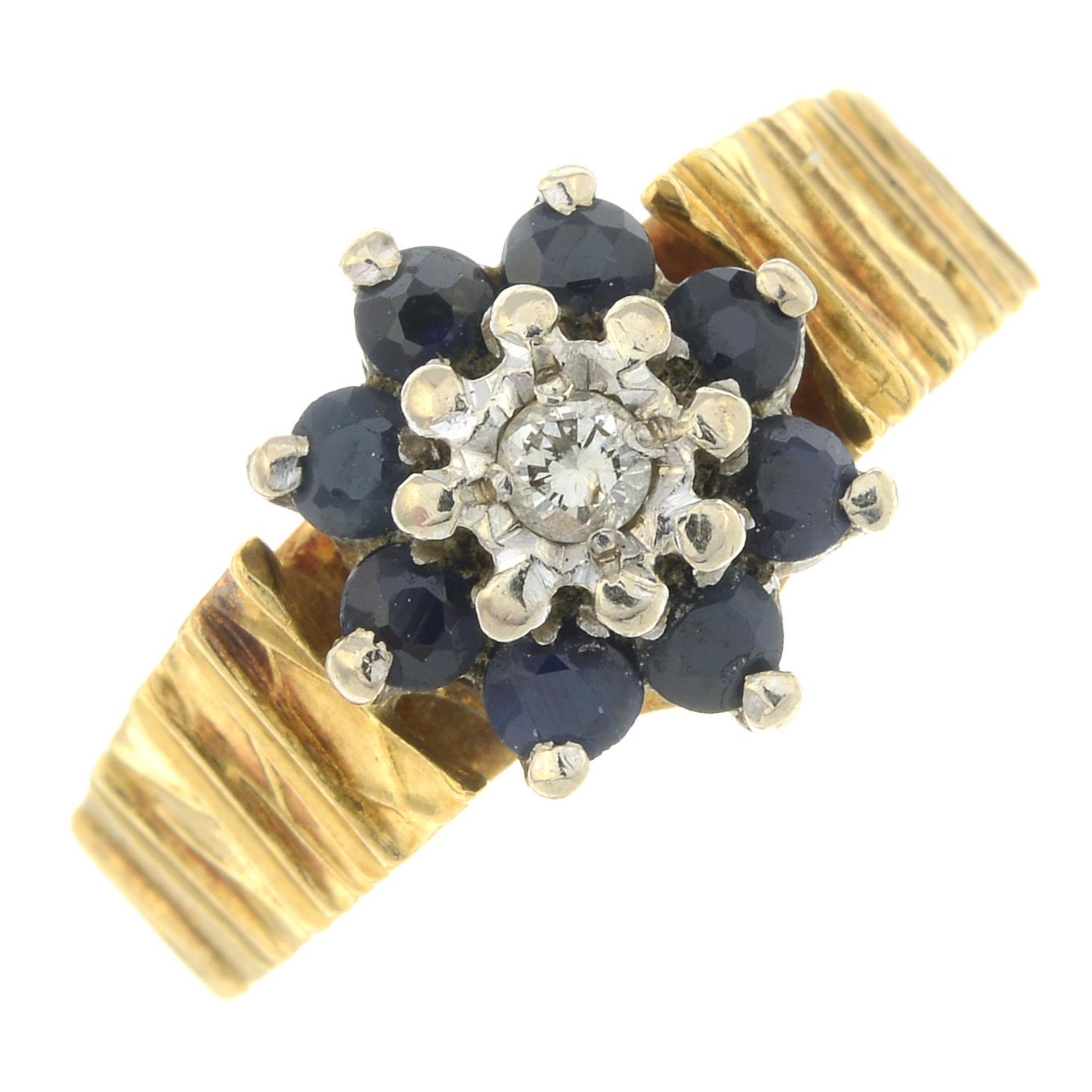 An 18ct gold sapphire and diamond cluster ring.Hallmarks for Birmingham, 1969.Ring size J.