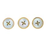 Three early 20th century 9ct gold mother-of-pearl buttons,