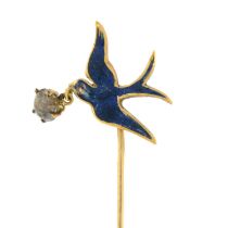 An early 20th century gold and blue enamel swallow stickpin,