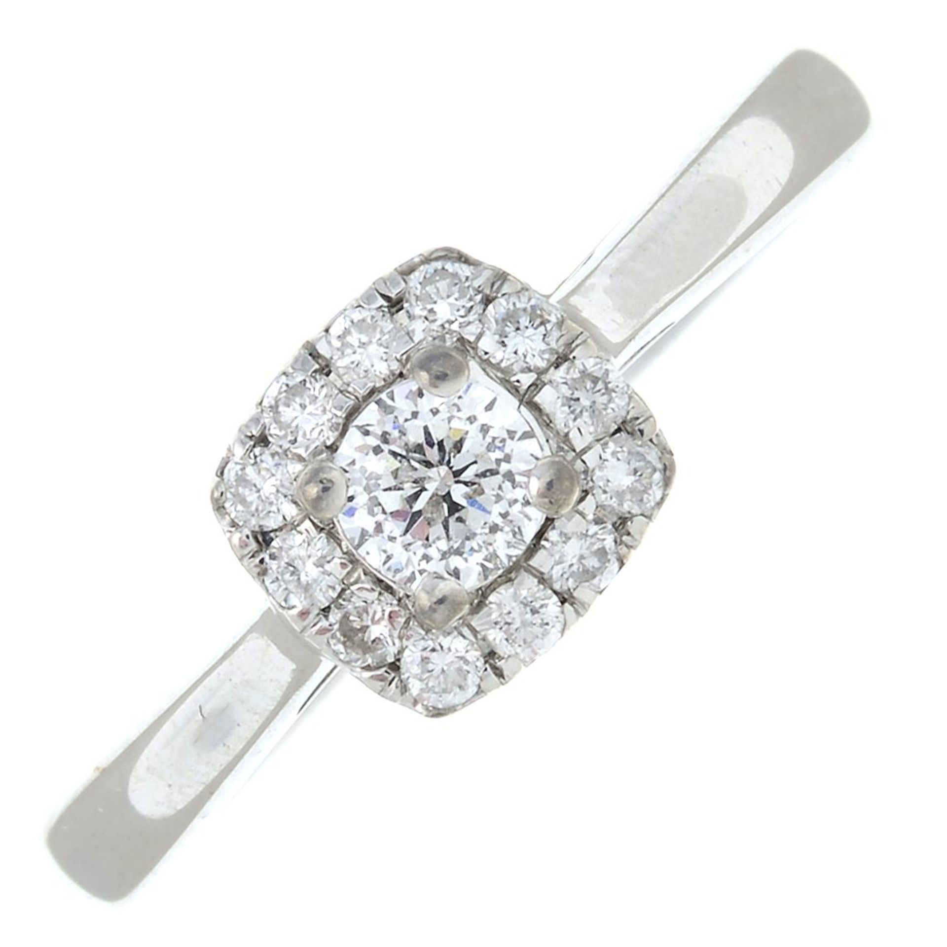 An 18ct gold brilliant-cut diamond cluster ring.Total diamond weight 0.25ct,