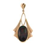 An early 20th century gold opal pendant.Length 3.7cms.