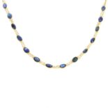 A sapphire single-strand necklace.Stamped 14K.