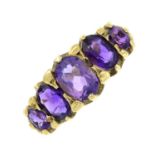 A 9ct gold amethyst five-stone ring.