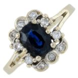 A sapphire and brilliant-cut diamond cluster ring.Stamped 585.Ring size P1/2.
