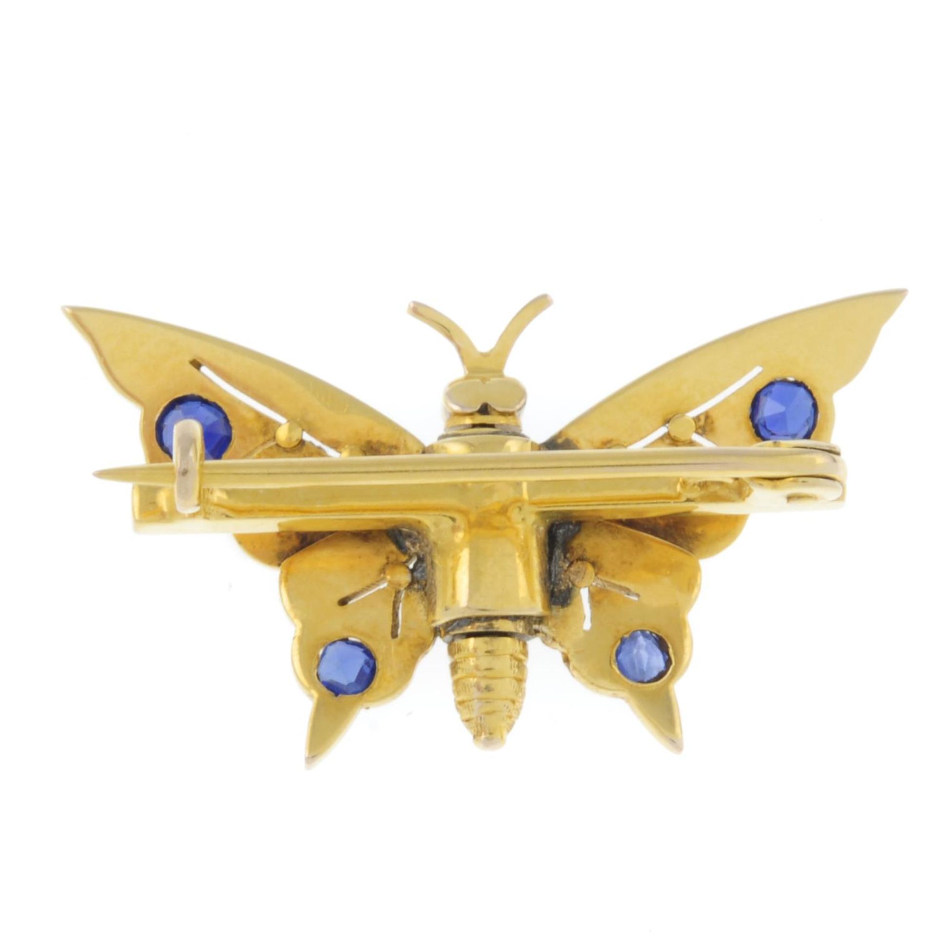 An early 20th century gold sapphire, split pearl and garnet butterfly brooch.Length 3.2cms. - Image 2 of 2