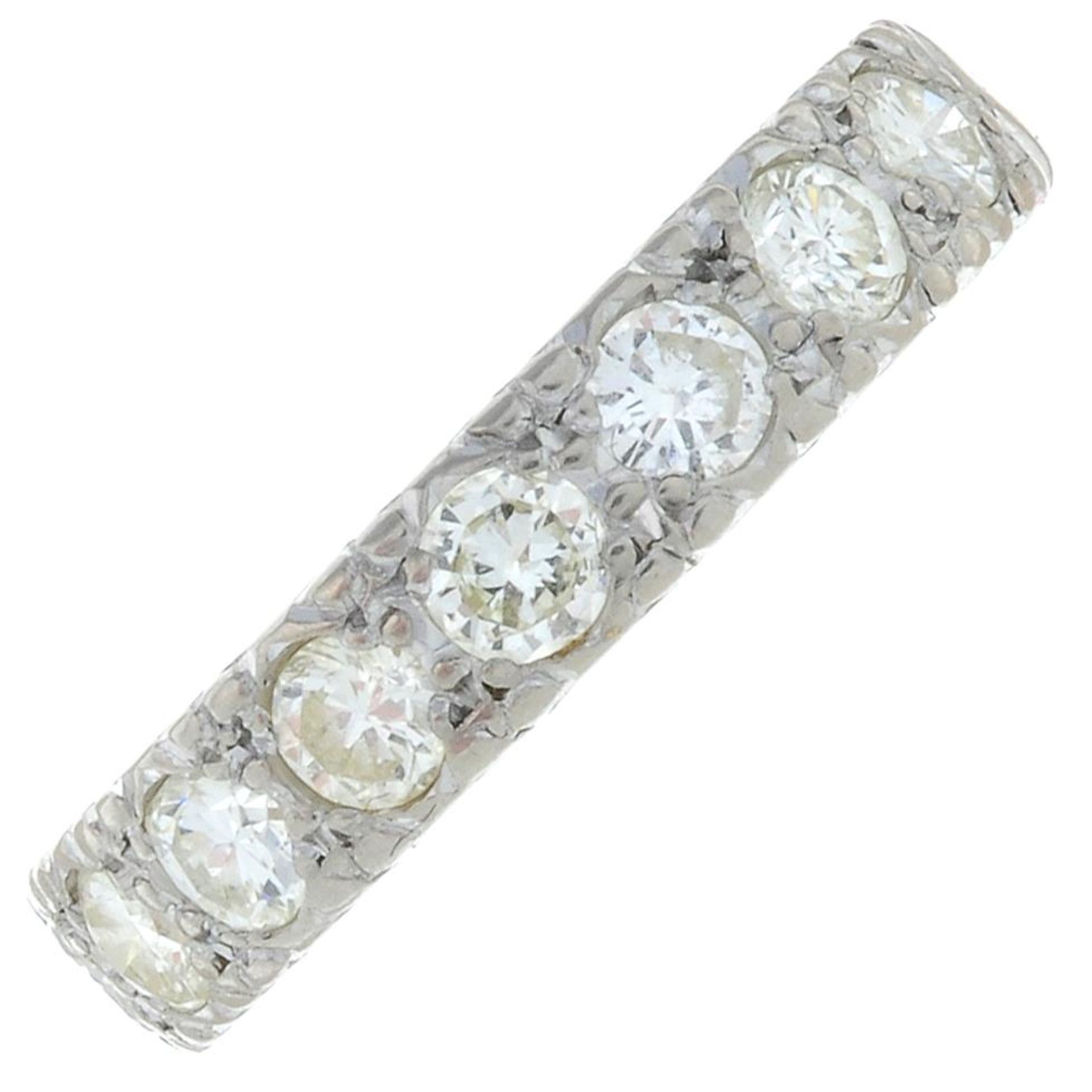 A brilliant-cut diamond half eternity ring.