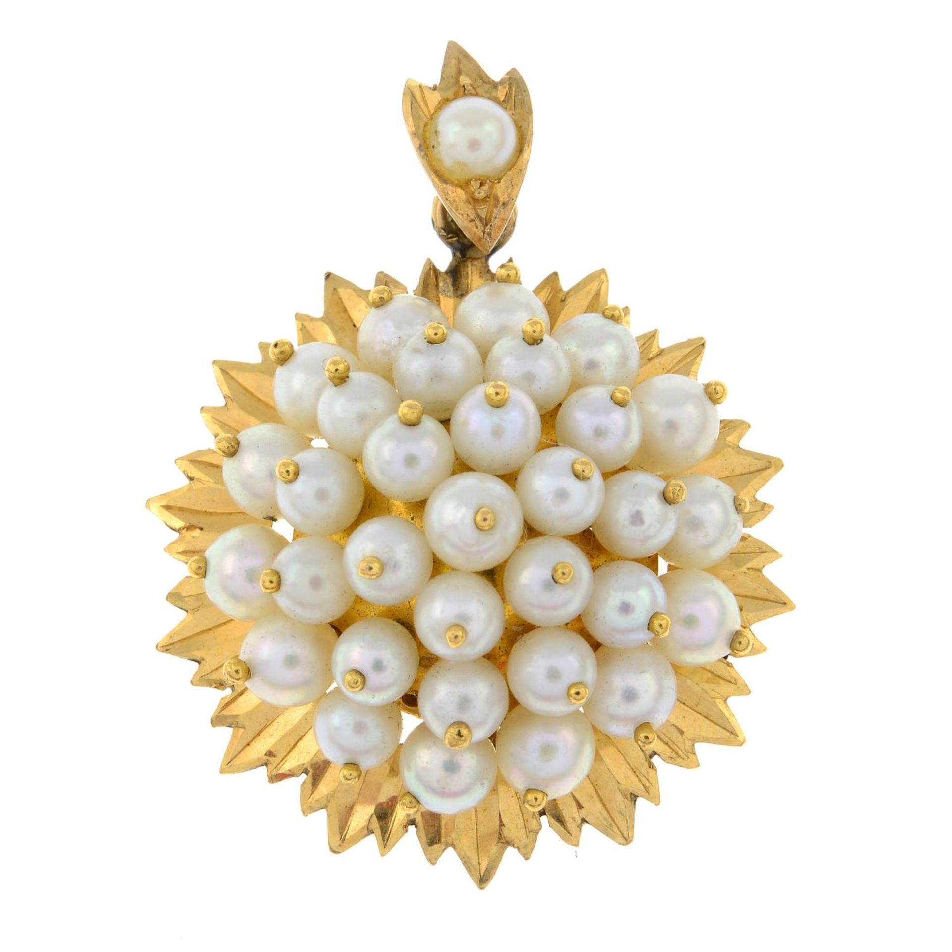 A seed pearl cluster pendant.Stamped 22C.