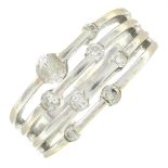 A brilliant-cut diamond dress ring.Estimated total diamond weight 0.50ct,