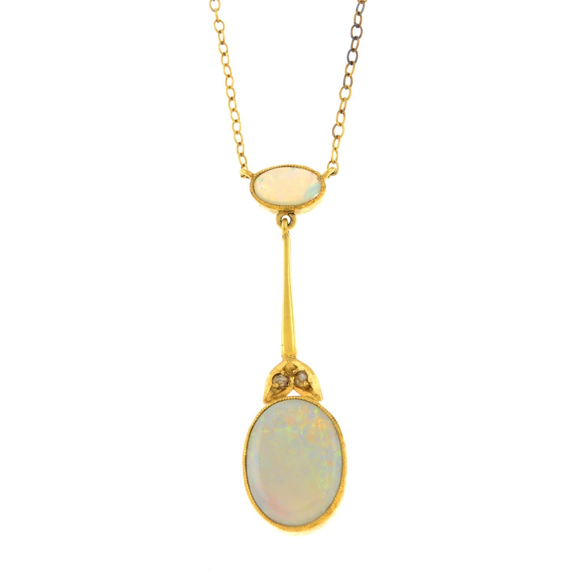 An early 20th century gold opal drop pendant,