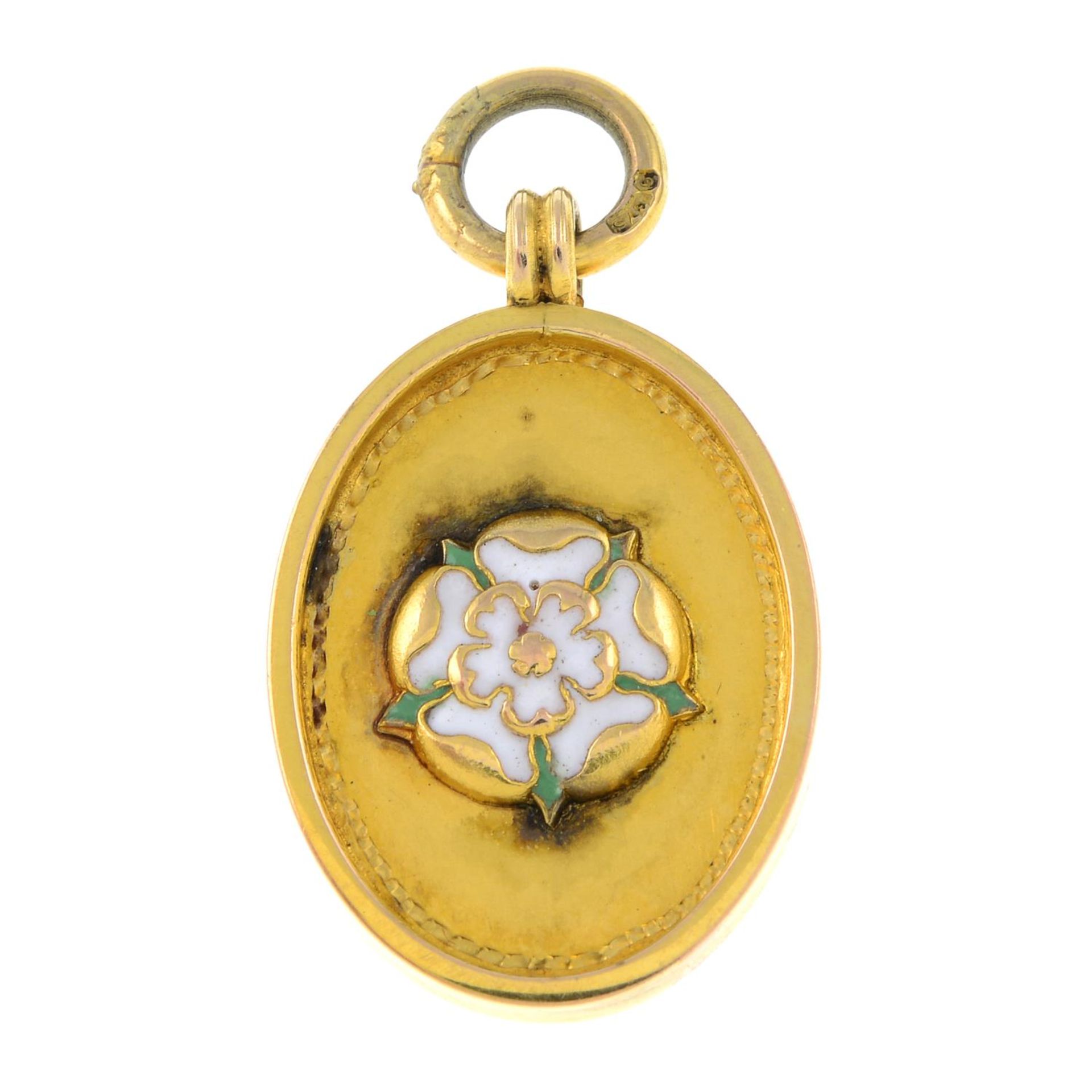 An early 20th century 9ct gold and enamel 'Royston Charity Cup' medallion.Hallmarks for Birmingham,