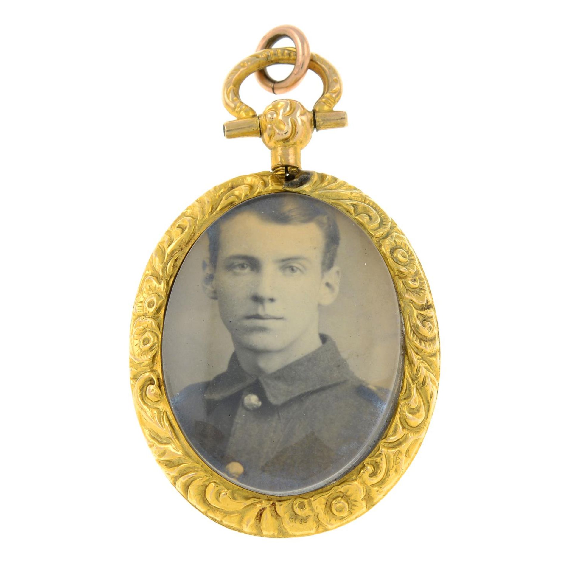 A late 19th century gold portrait miniature locket pendant.Length 4.5cms.