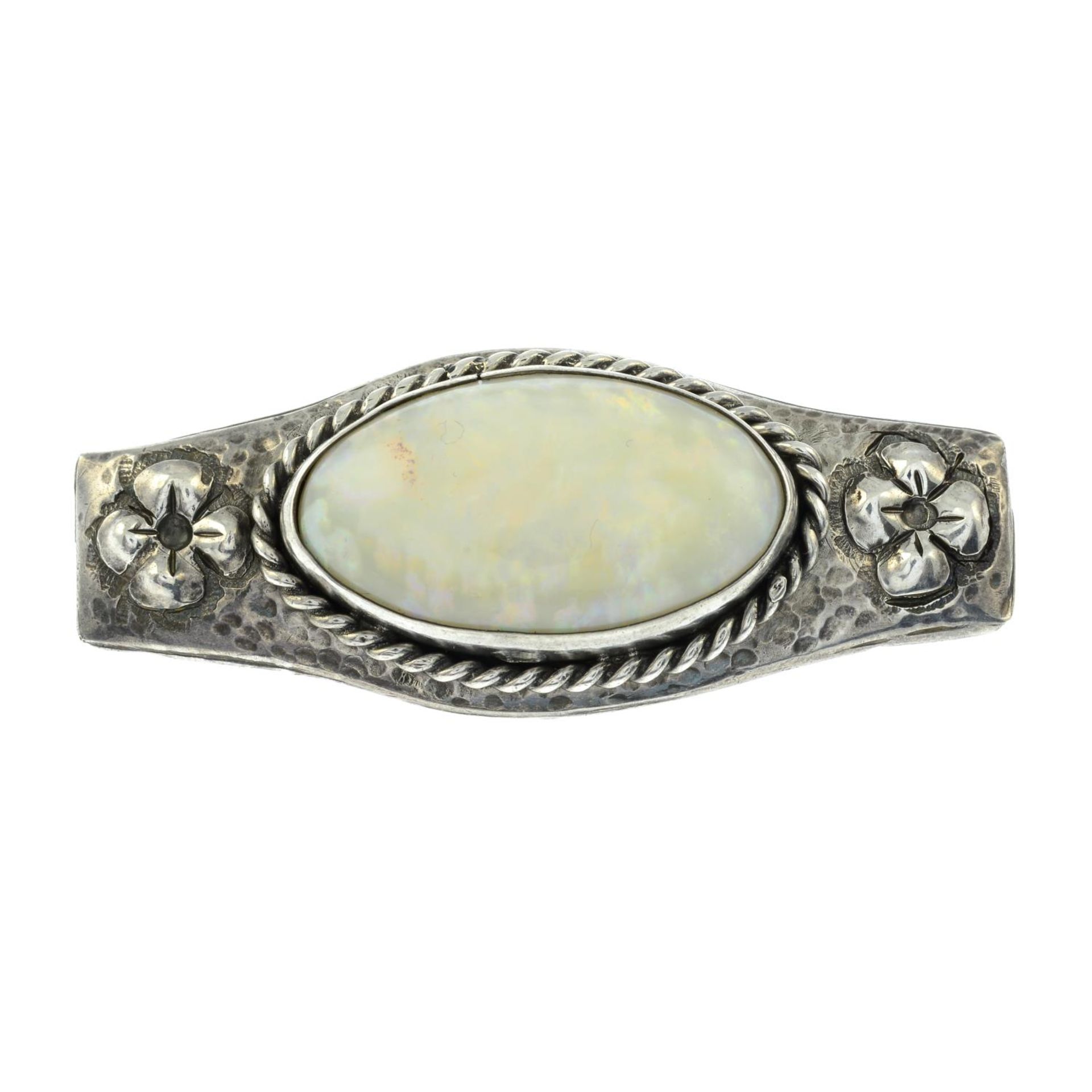 An Arts and Crafts silver opal brooch, in the manner of Mary Thew.Length 5cms.