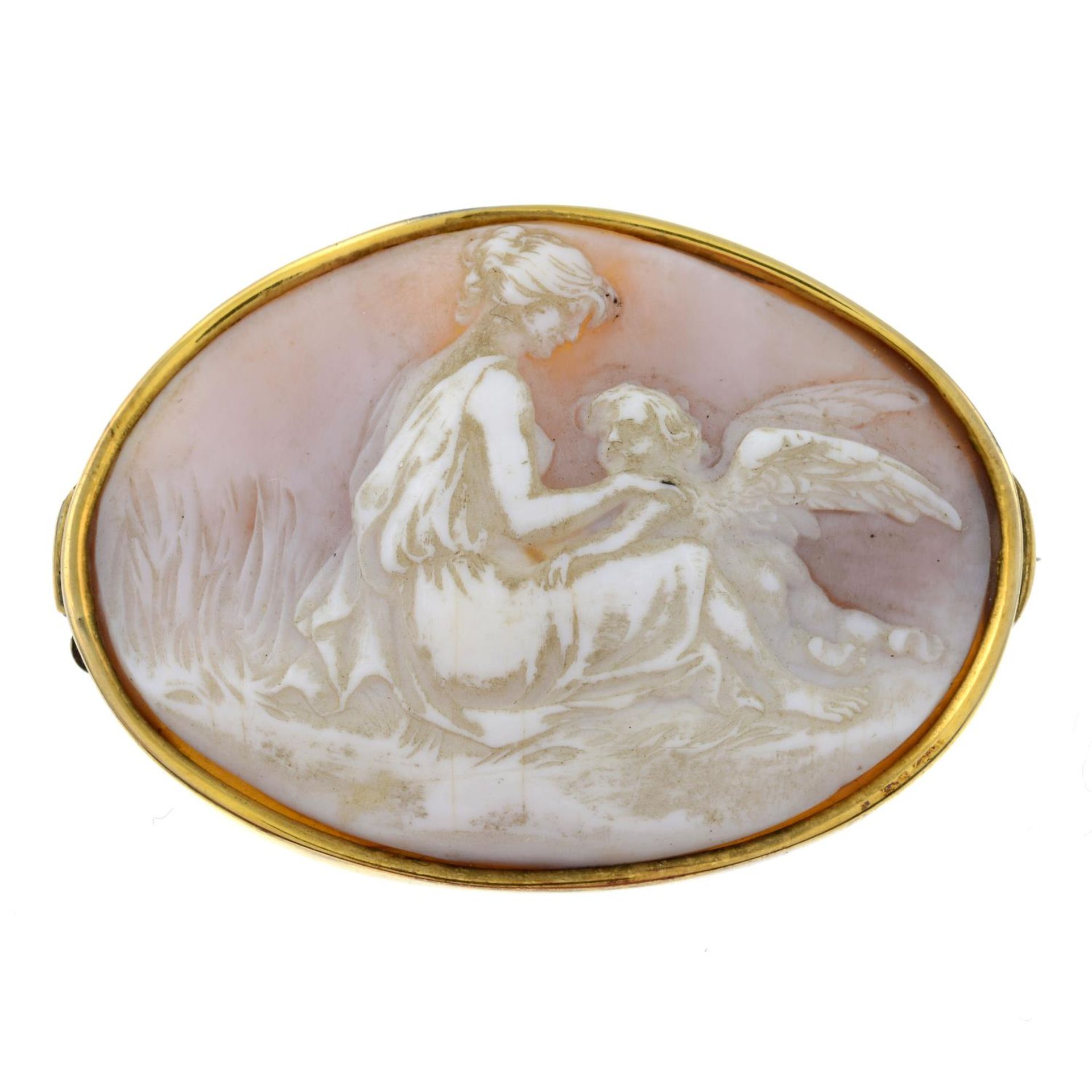 An early 20th century gold shell cameo brooch, carved to depict Venus and Cupid.Length 5.2cms.