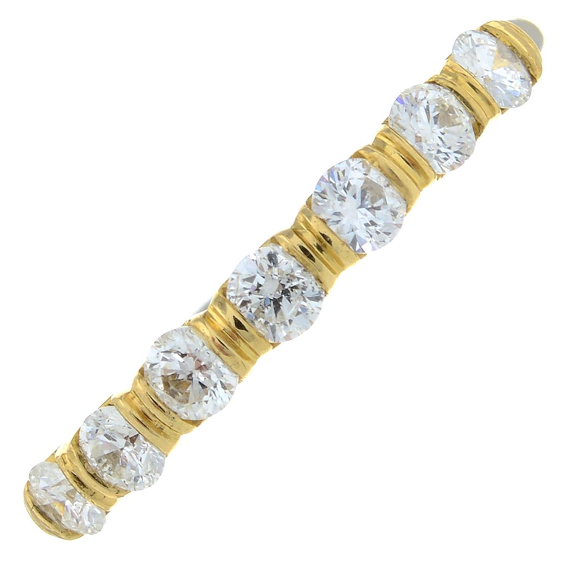 An 18ct gold brilliant-cut diamond half eternity ring.Estimated total diamond weight 0.50ct,