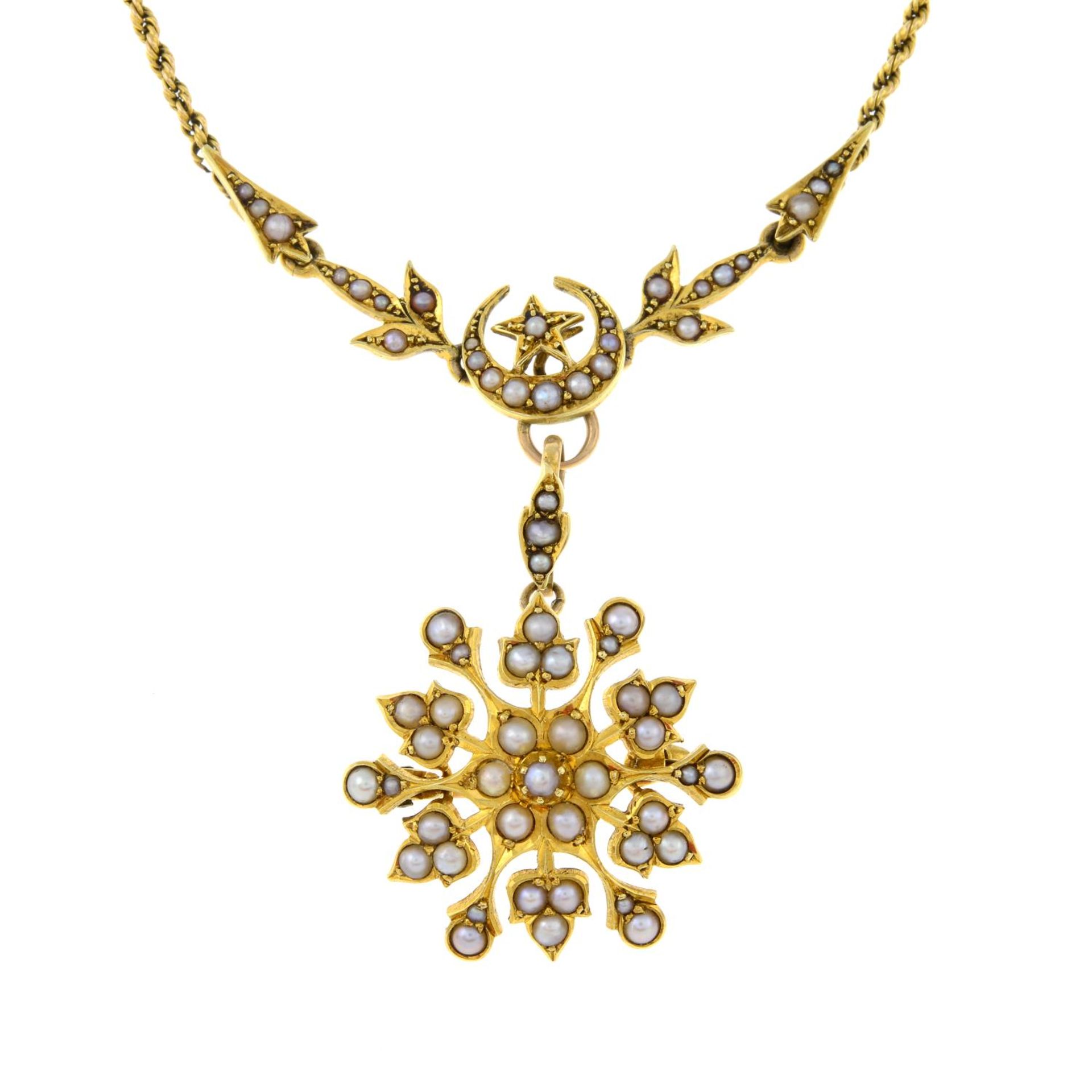 A late 19th century 15ct gold split pearl floral pendant,
