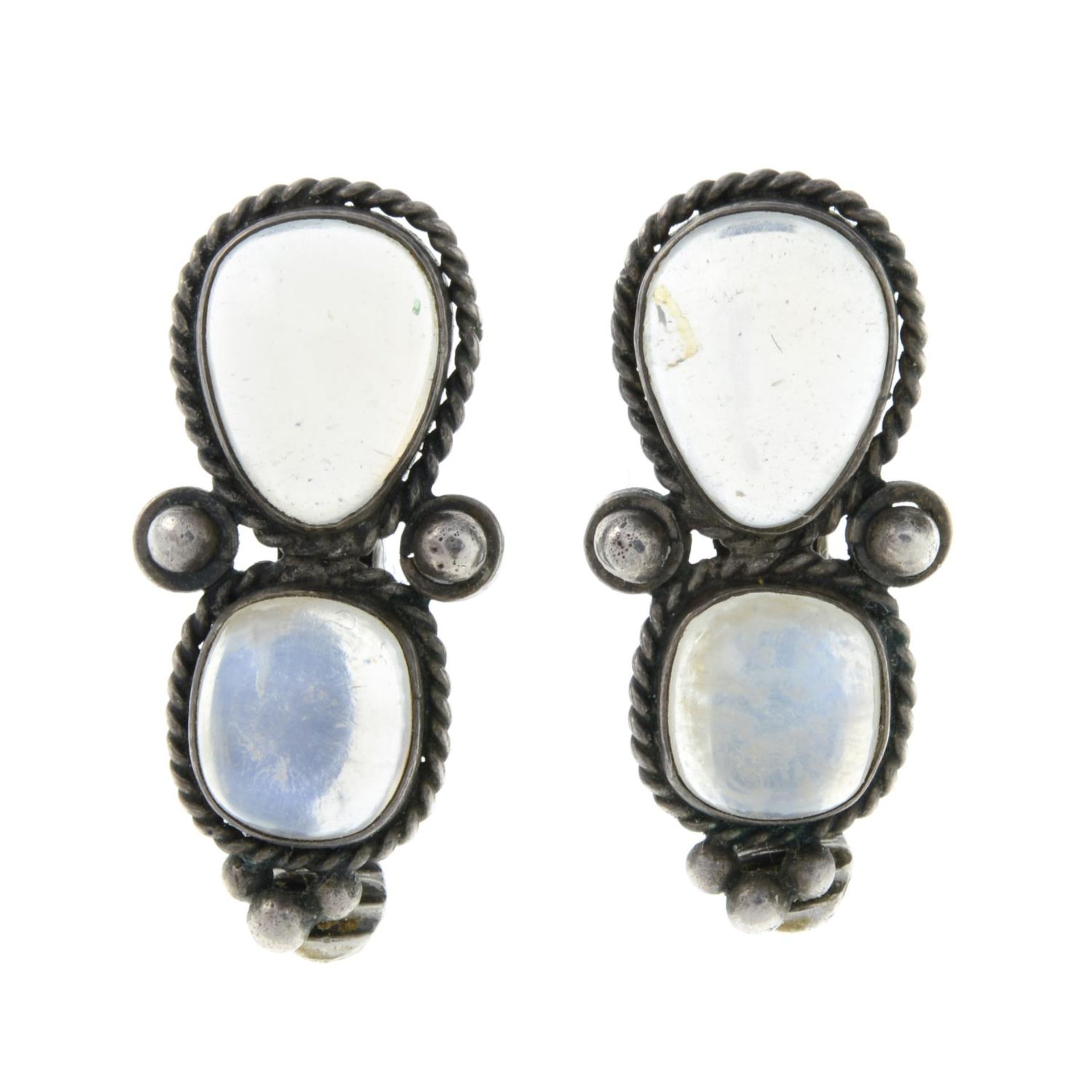 A pair of Arts and Crafts moonstone earrings.Length 2.5cms.
