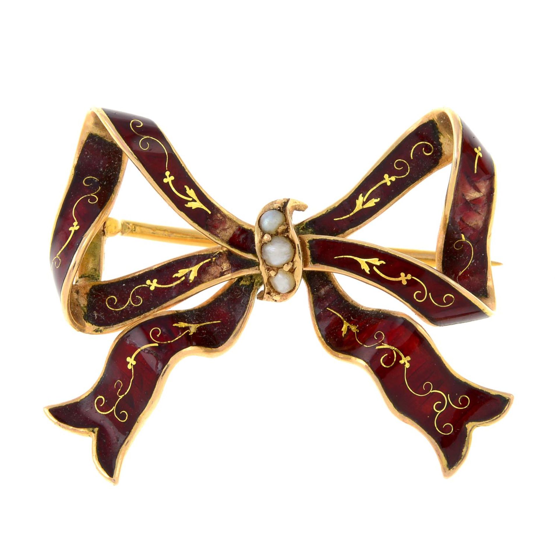 An early 20th century gold split pearl and red enamel bow brooch.Length 2.6cms.