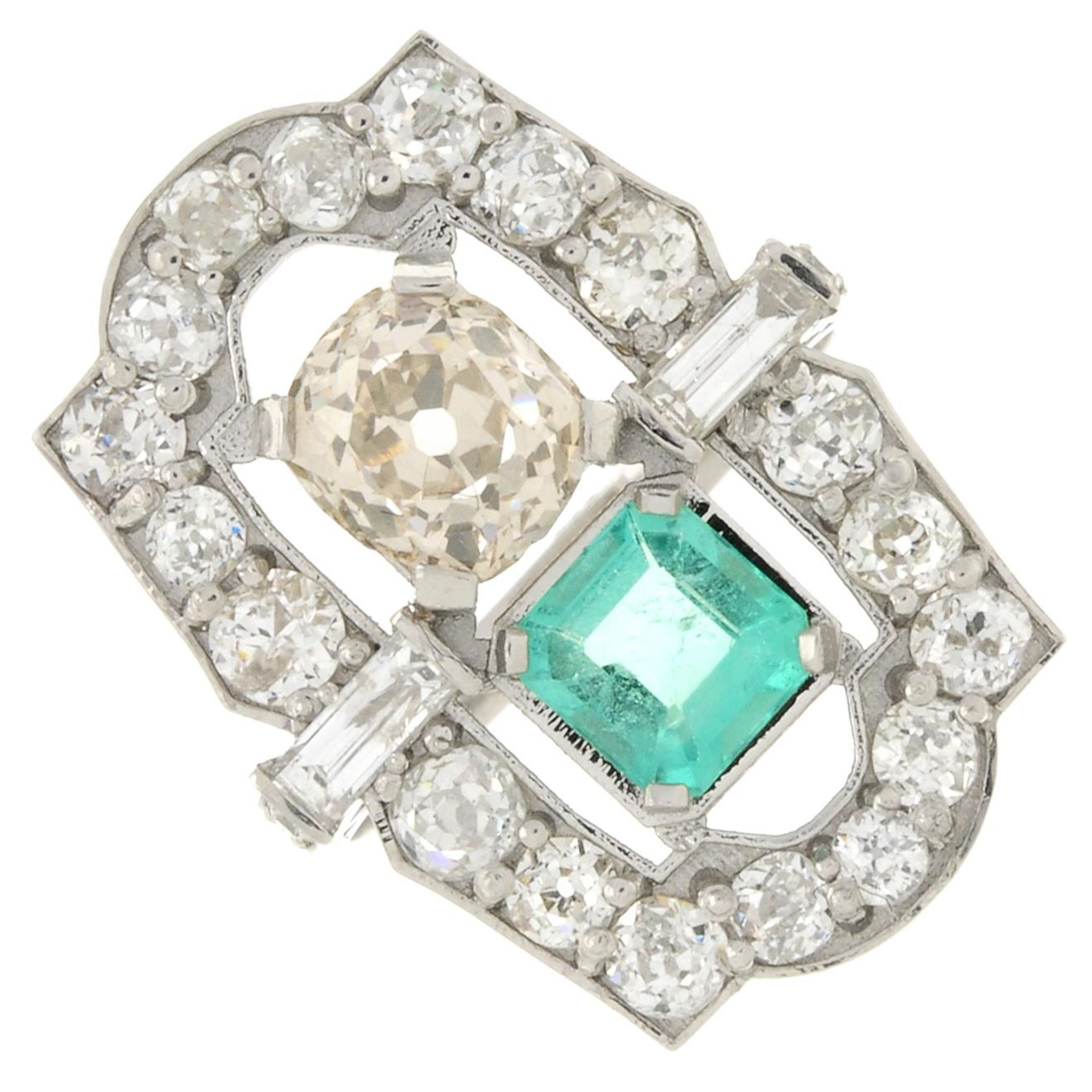 An emerald, old-cut coloured diamond and vari-cut diamond dress ring.Emerald calculated weight