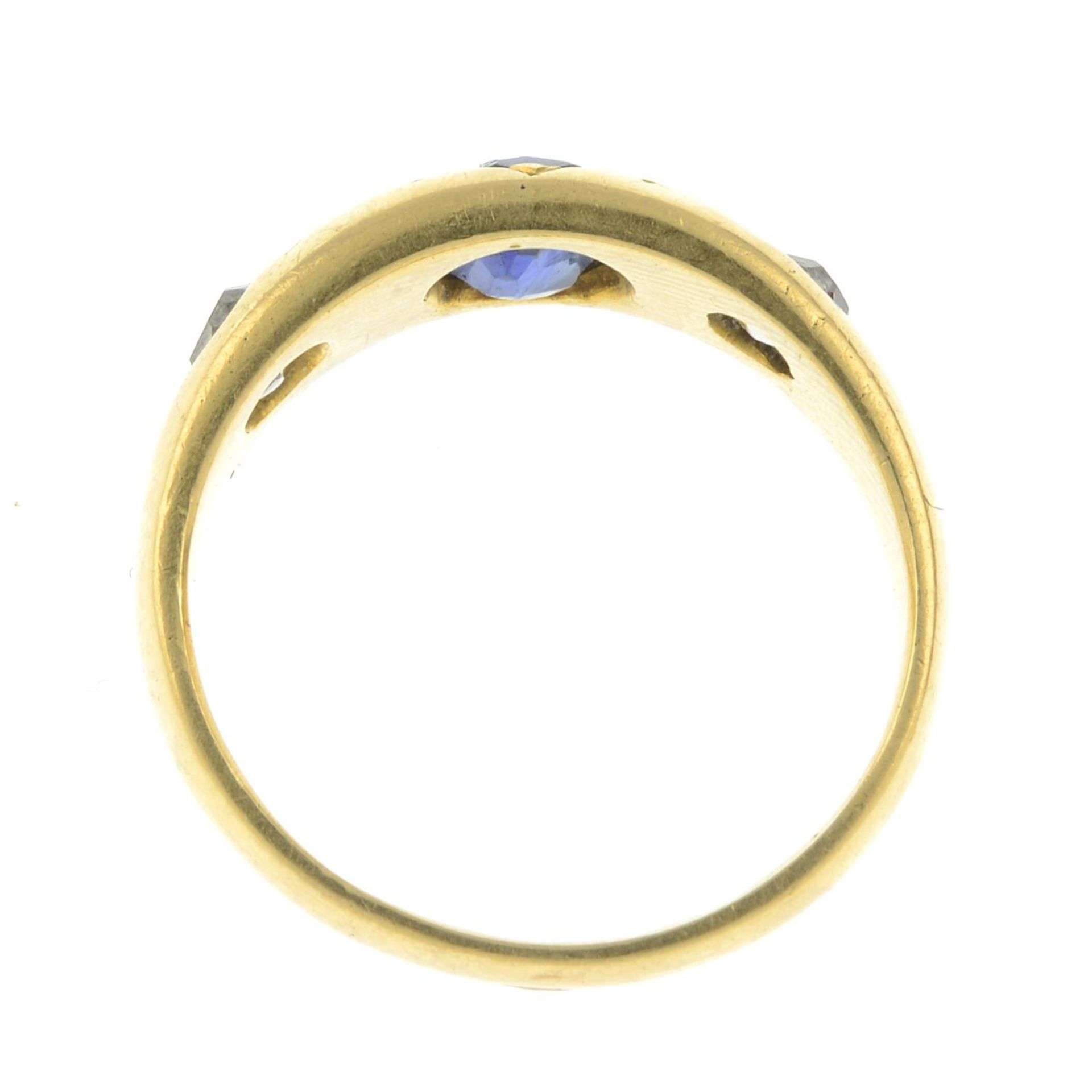 A late Victorian 18ct gold old-cut diamond and sapphire three-stone ring. - Bild 4 aus 4