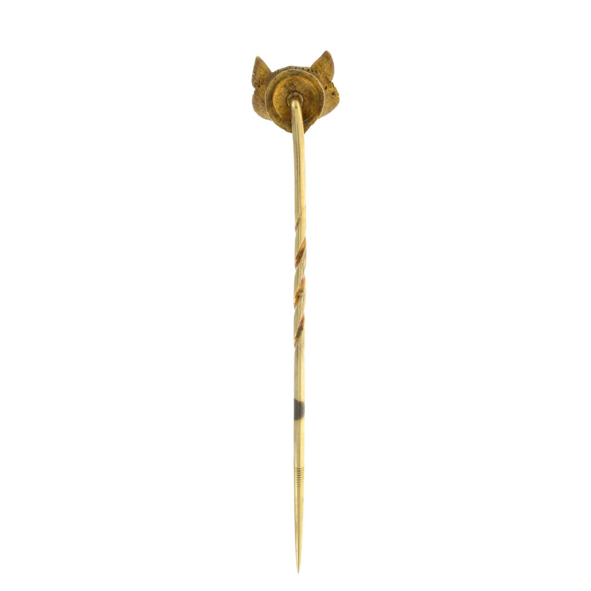 A late 19th century gold fox mask stick pin, with ruby eye detail.Length of stick pin head 0.9cm. - Bild 4 aus 4