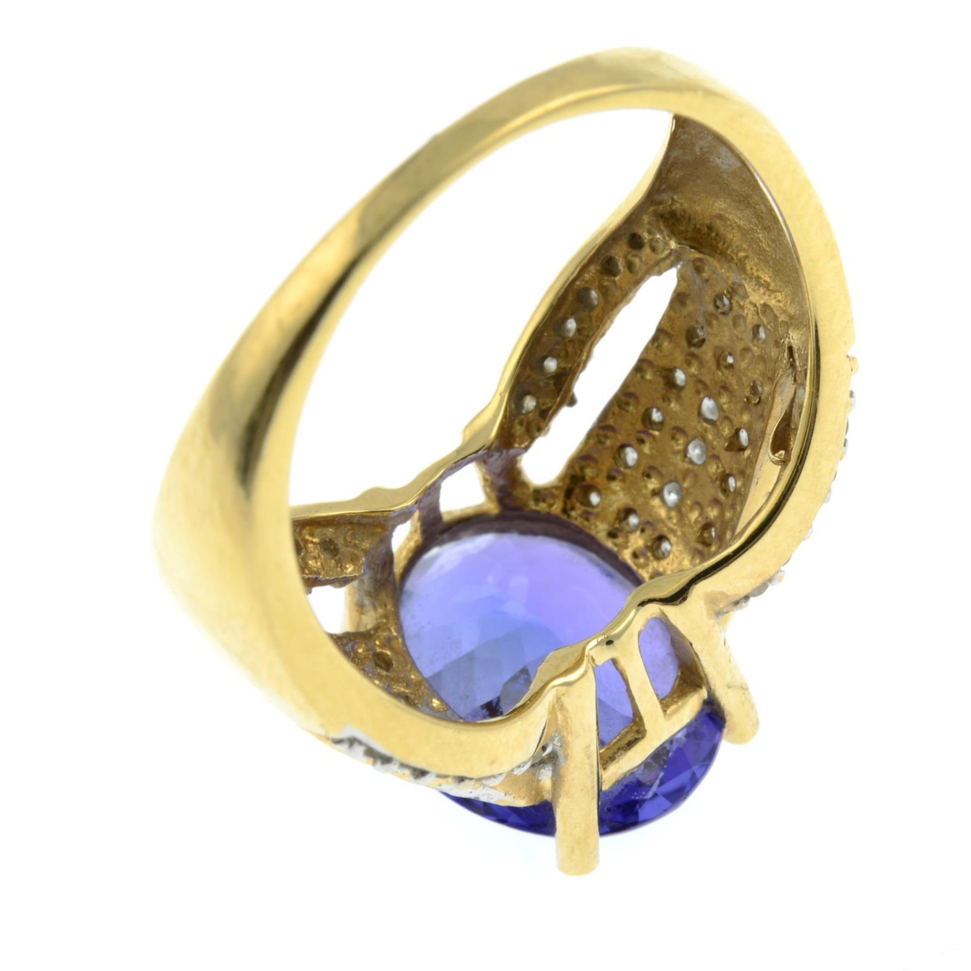 An 18ct gold tanzanite and brilliant-cut diamond dress ring.Tanzanite calculated weight 4.17cts, - Bild 2 aus 3