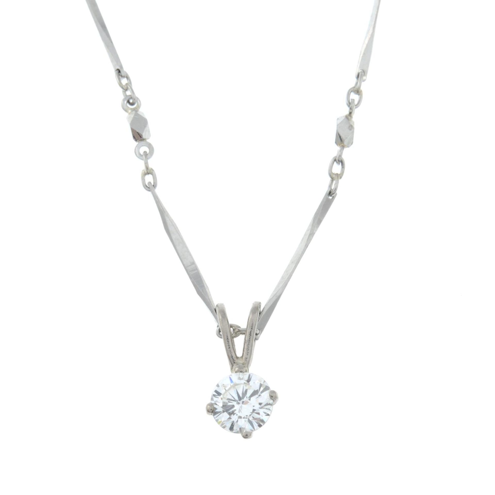 An 18ct gold brilliant-cut diamond single-stone pendant,