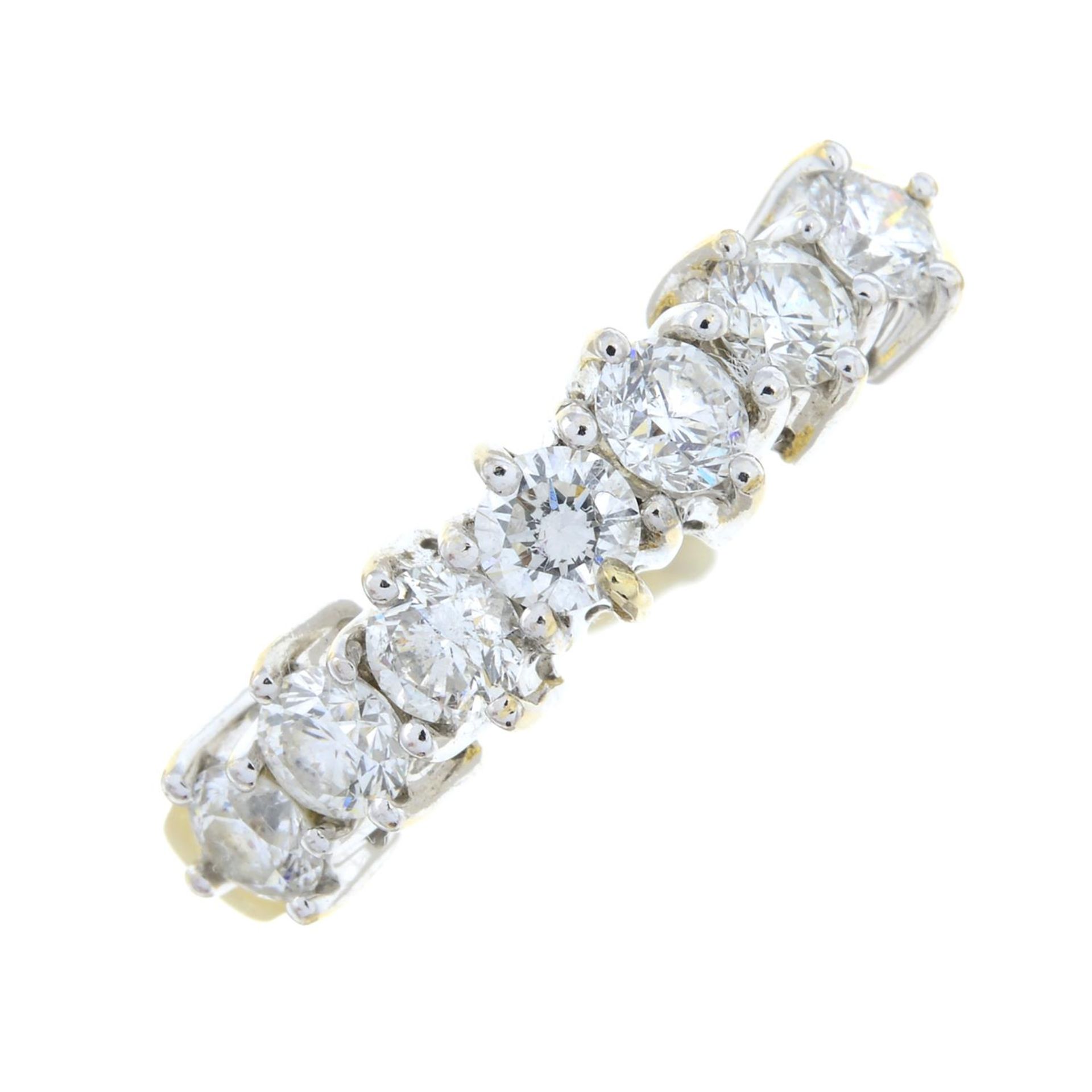 An 18ct gold brilliant-cut diamond seven-stone ring.Total diamond weight 1ct,