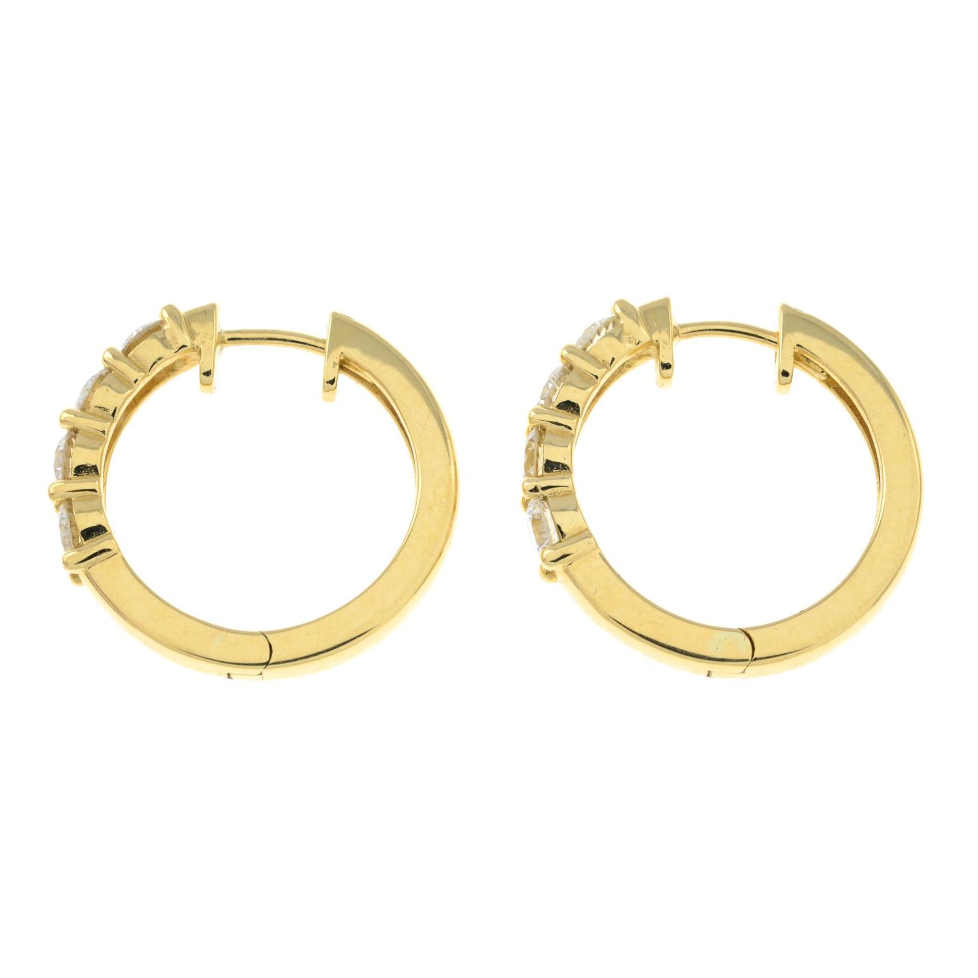 A pair of brilliant-cut diamond hoop earrings.Estimated total diamond weight 1.20cts, - Bild 3 aus 3