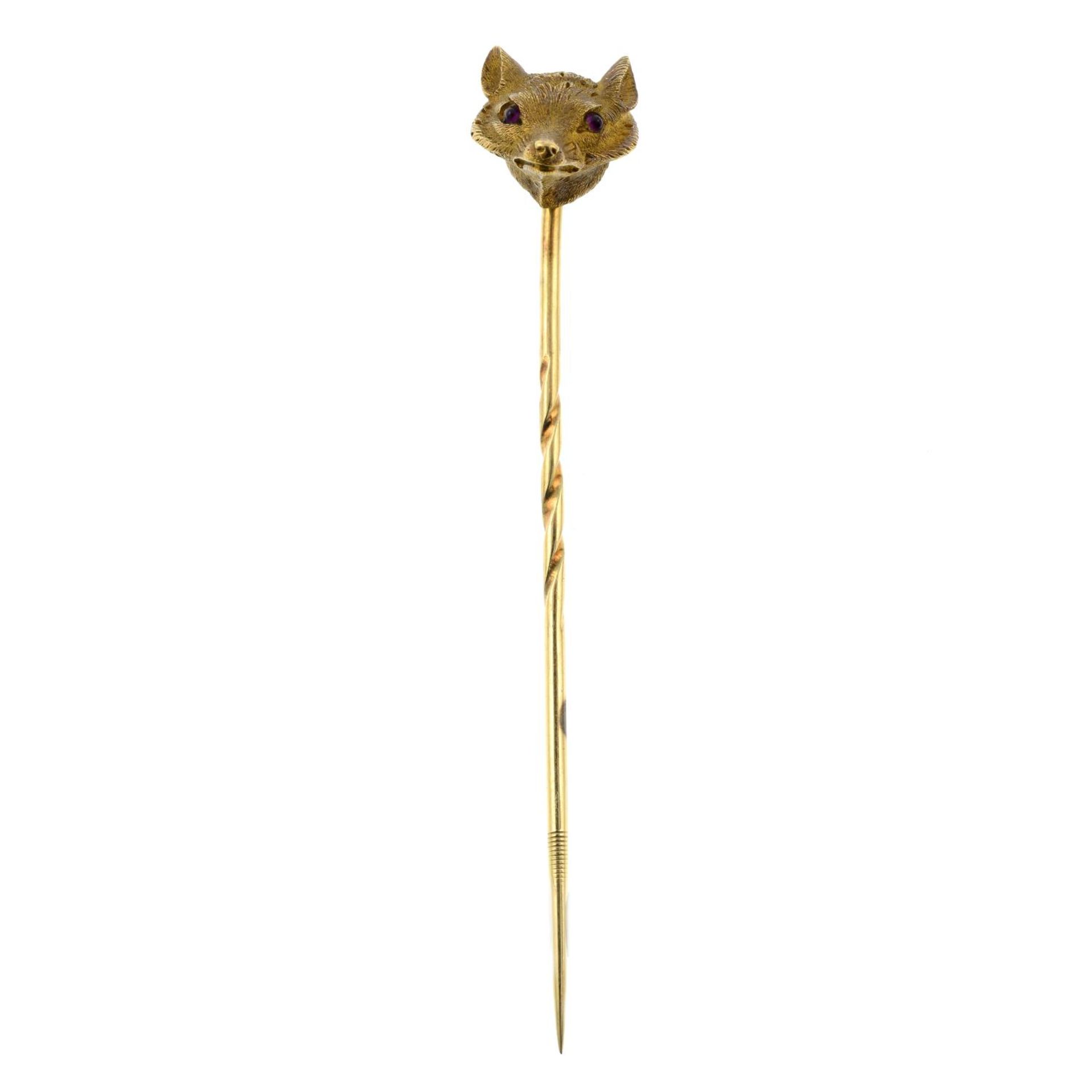 A late 19th century gold fox mask stick pin, with ruby eye detail.Length of stick pin head 0.9cm. - Bild 2 aus 4