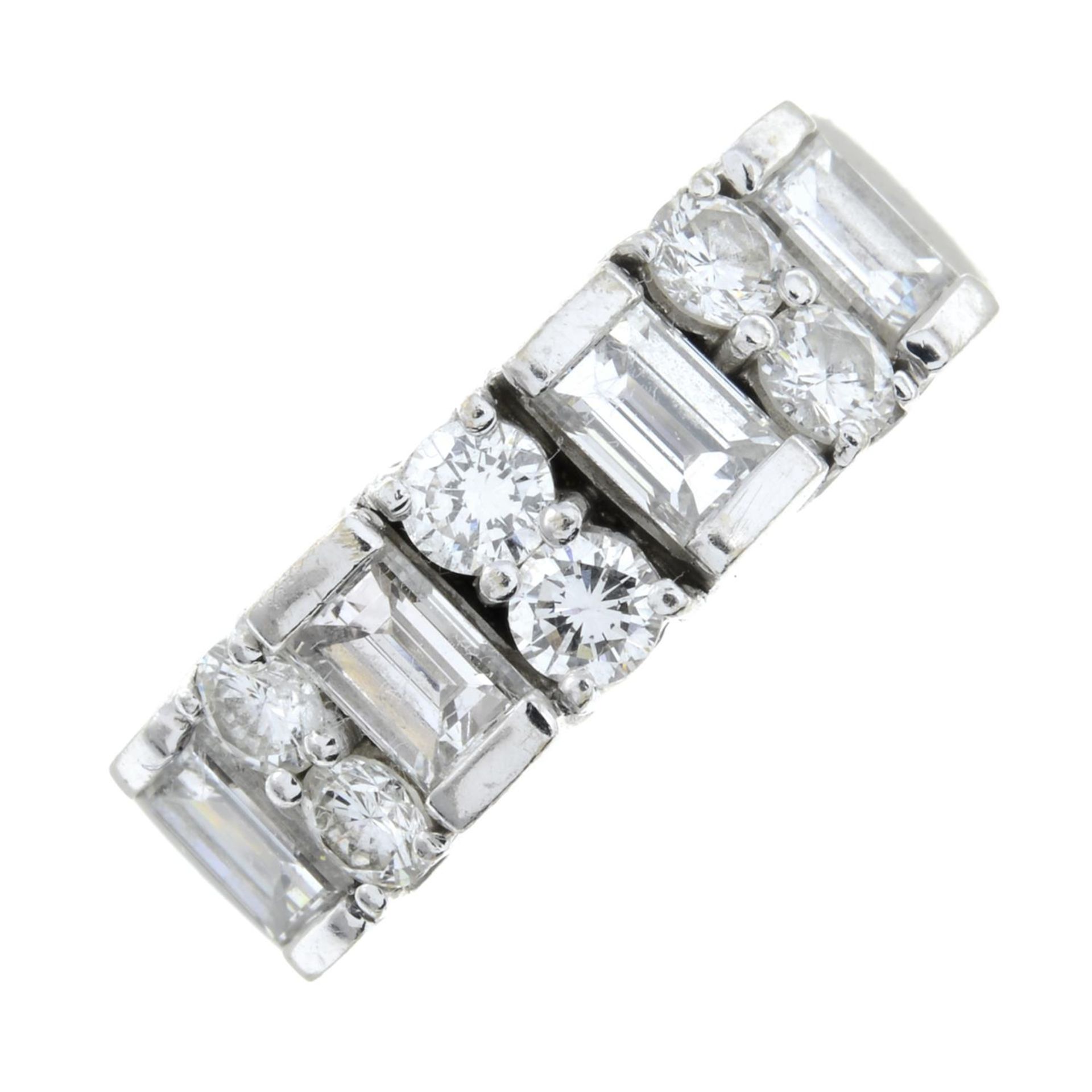 A baguette and brilliant-cut diamond dress ring.Estimated total diamond weight 1.75cts,