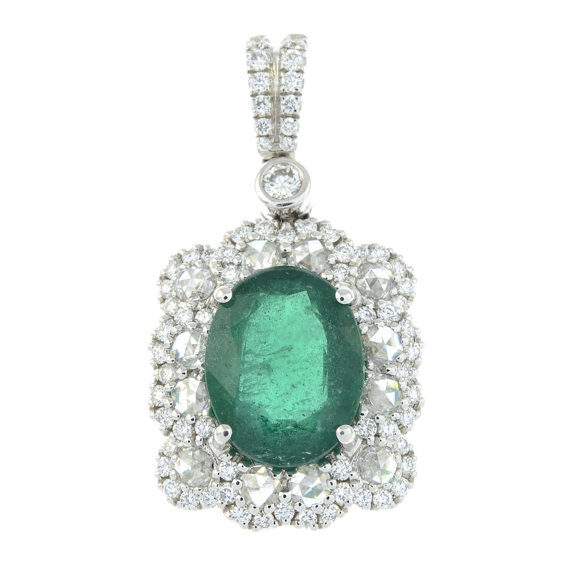 An emerald and vari-cut diamond cluster pendant.Emerald weight 2.53cts.Total diamond weight