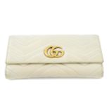 GUCCI - a Matelassé Marmont continental wallet.