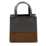 BURBERRY - a brown leather and suede mini tote handbag.