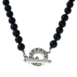 TIFFANY & CO - an onyx bead toggle clasp necklace.Signed Tiffany & Co.