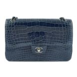 CHANEL - a shiny blue Jumbo crocodile Classic Double Flap handbag.