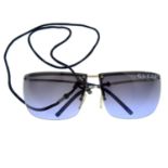 GUCCI - a pair of rimless sunglasses.